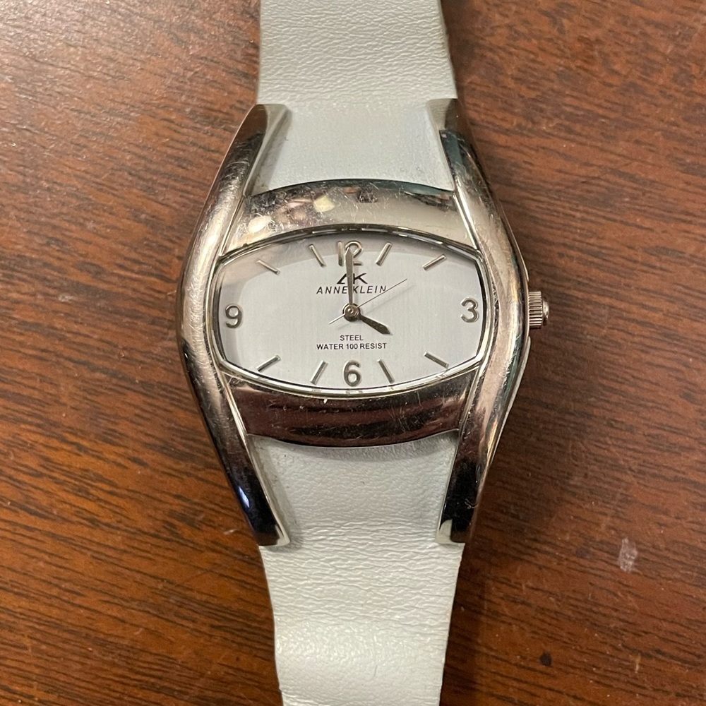 Anne Klein watch with blue leather strap.